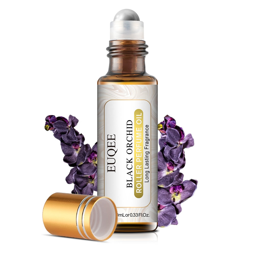 EUQEE Black Orchid roller perfume oil with flowers on a white background