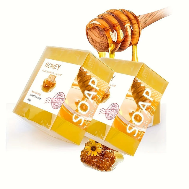 Honey soap packaging with a honey dipper on a white background