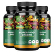 Four bottles of Superfood Greens supplement with colorful label on a white background