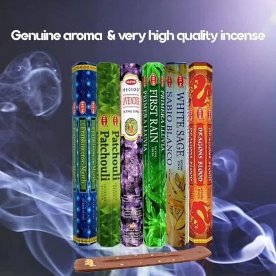 Assorted incense sticks with smoke on a dark background