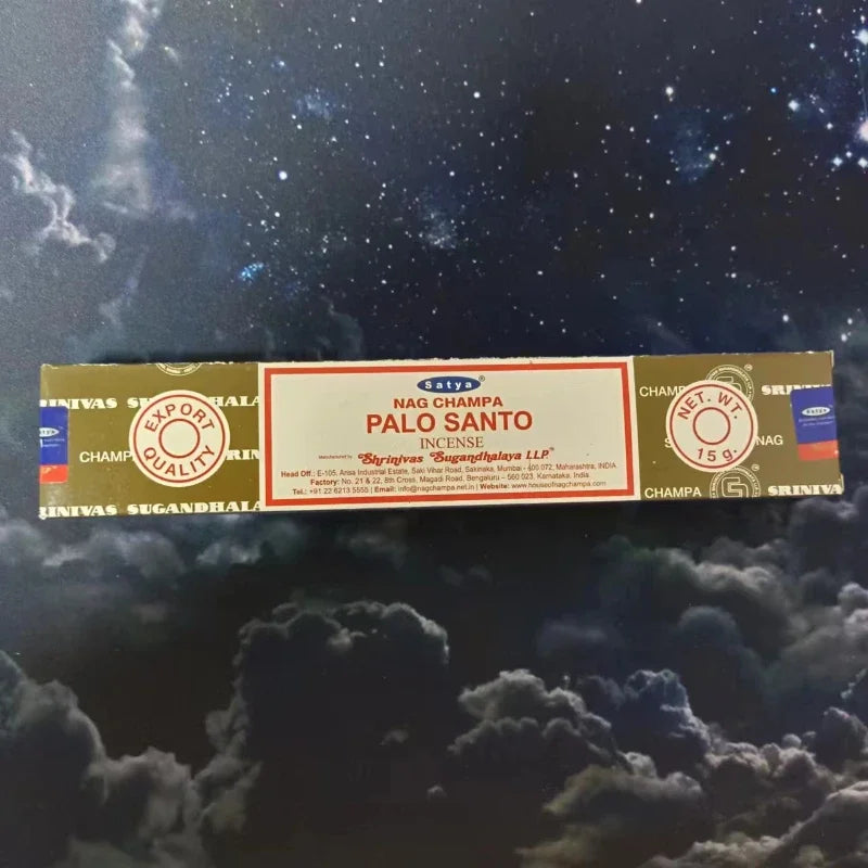 Box of Nag Champa Palo Santo incense on a starry night background