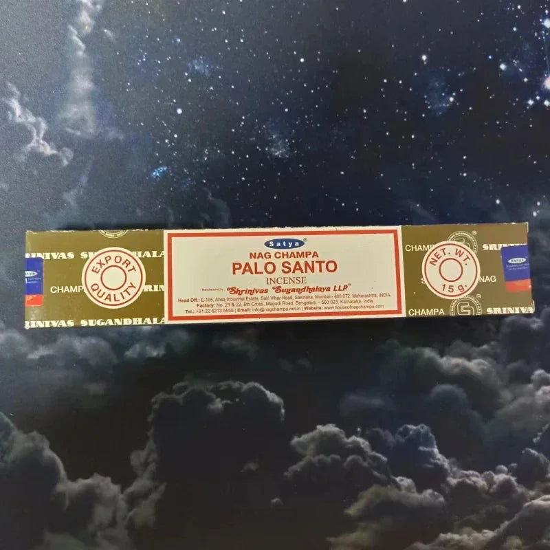 Box of Nag Champa Palo Santo incense on a starry night background