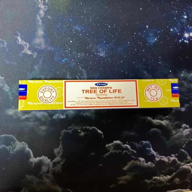 Box of Nag Champa Tree of Life incense on a starry night background