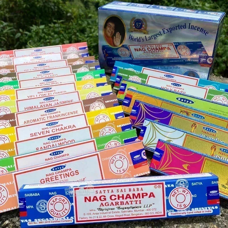 Collection of Satya Nag Champa incense boxes in various colors and designs.