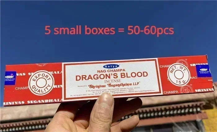 Box of Nag Champa Dragon's Blood incense with text indicating quantity