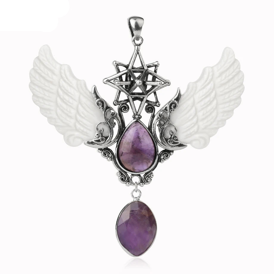 Pendant with wings and purple stones on a white background