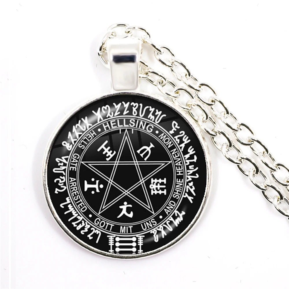 Black circular pendant with white symbols and text on a silver chain against a white background