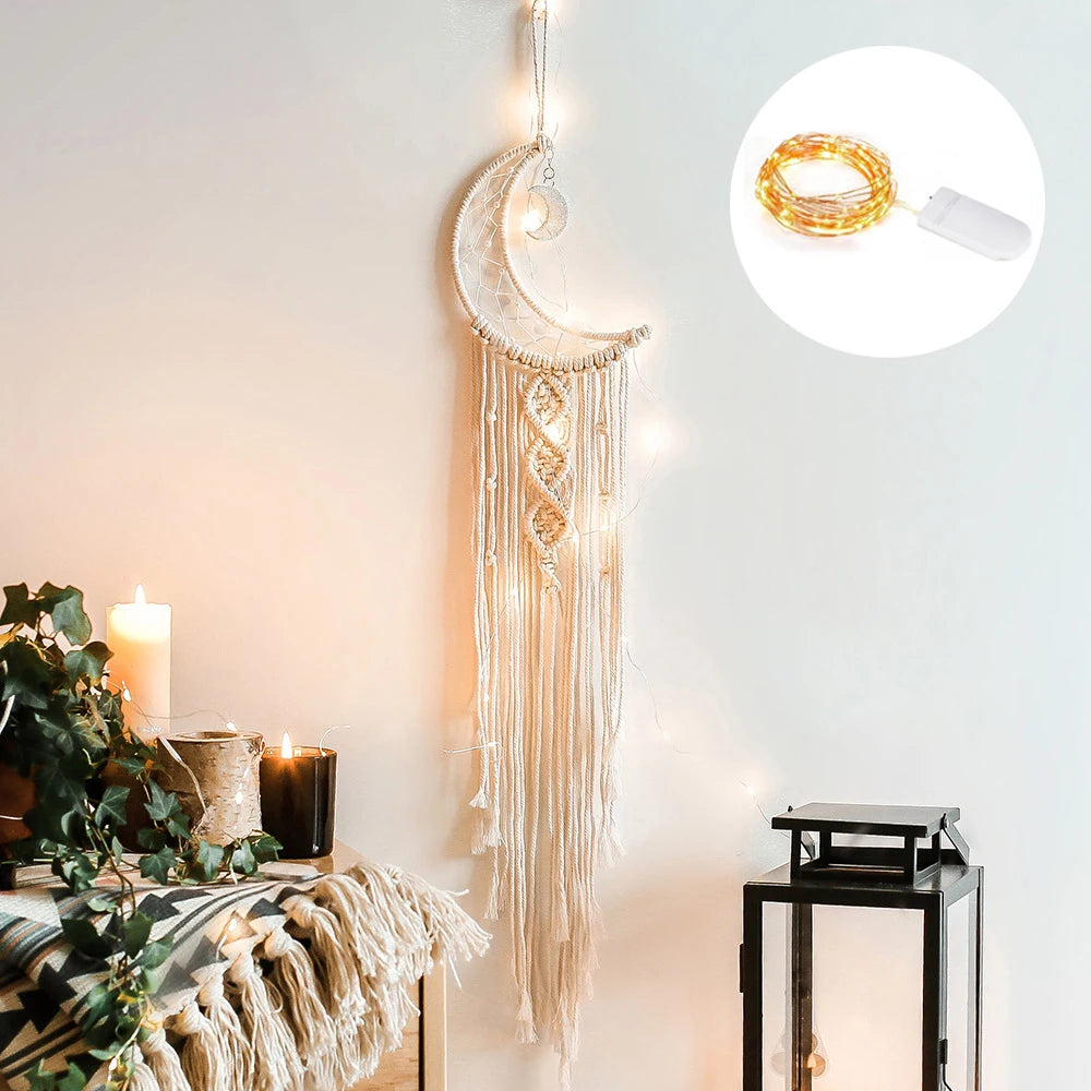 Decorative wall hanging with moon design and LED string lights on a neutral background.