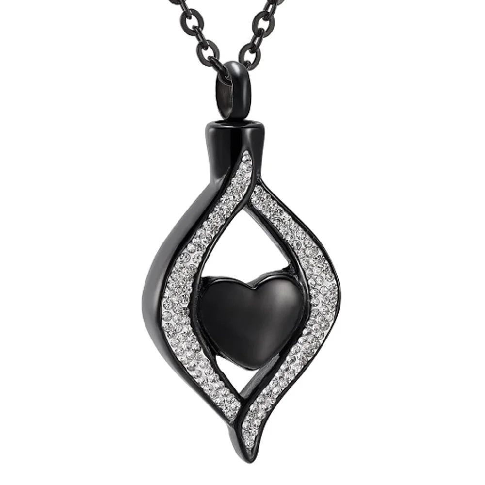 Black heart-shaped pendant with silver accents on a white background