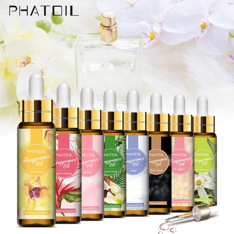 Collection of Phatoil fragrance oil bottles with droppers on a floral background