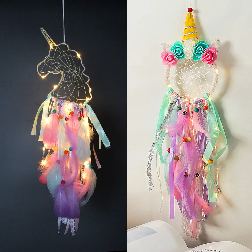 Unicorn-shaped dreamcatcher with lights and feathers on a dark background