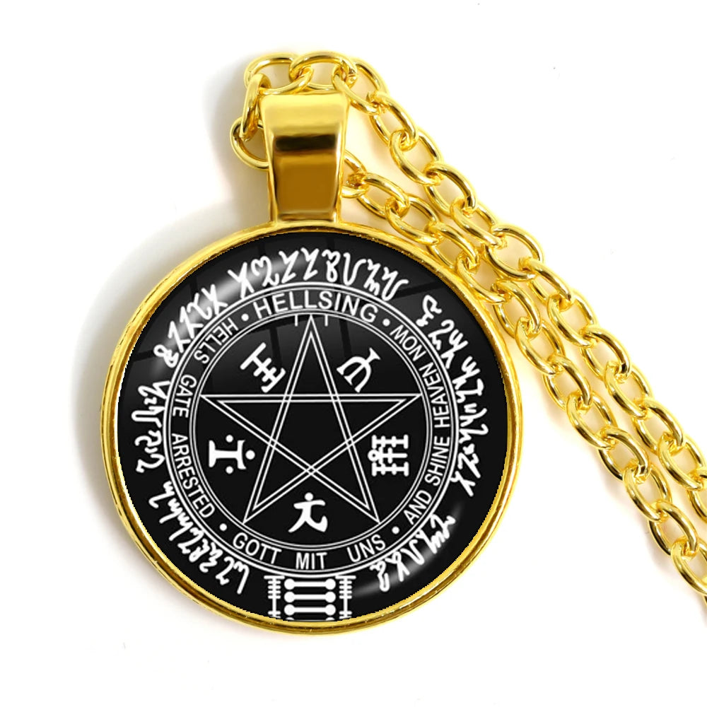 Gold chain with a black pendant featuring religious symbols on a white background