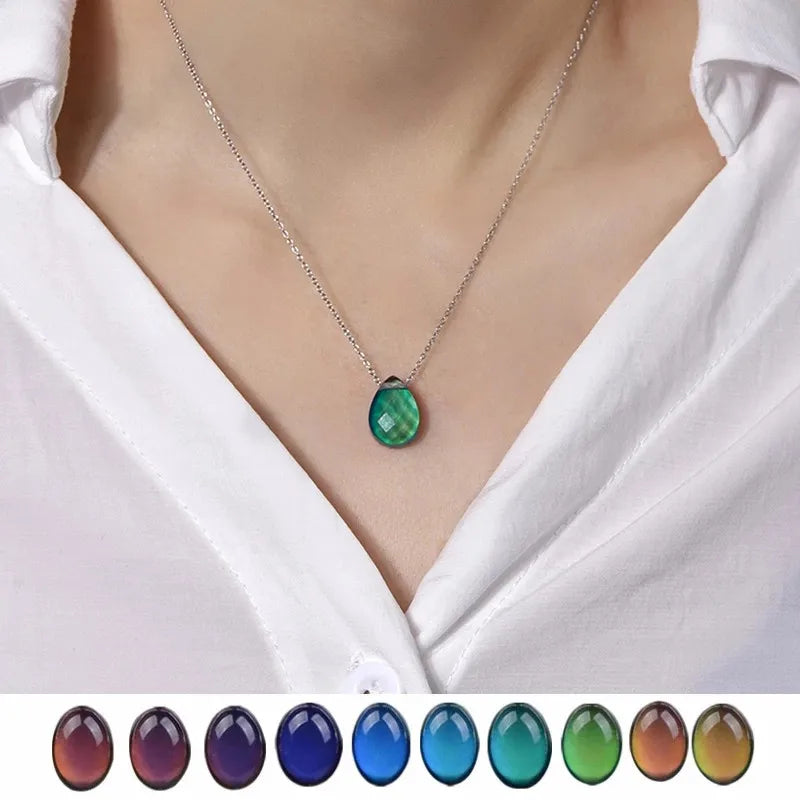 Necklace with a green pendant on a white shirt, with color swatches below.