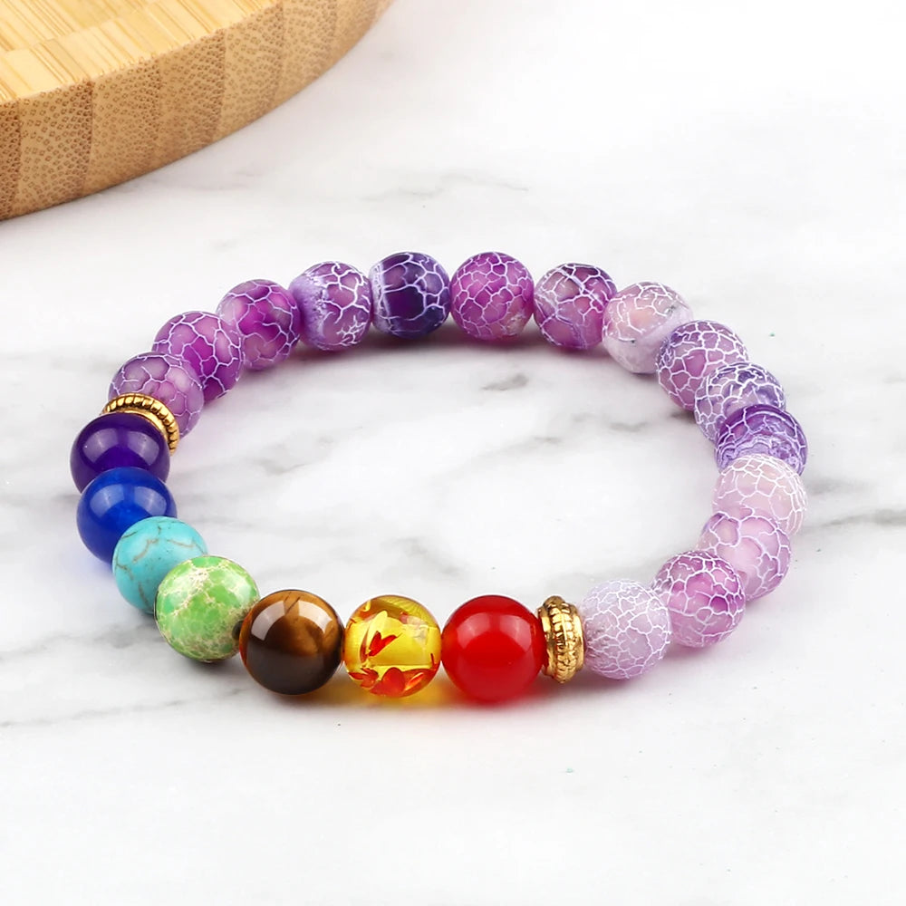 Colorful beaded bracelet on a marble surface
