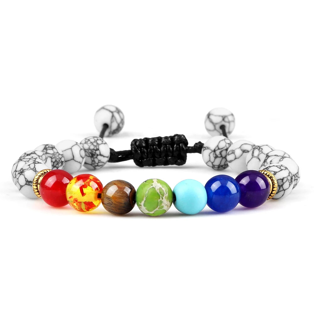 Colorful beaded bracelet with black marbleized ends on a white background