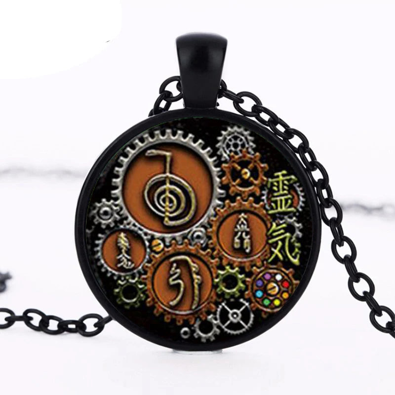 Necklace with a circular pendant featuring gears and symbols on a white background