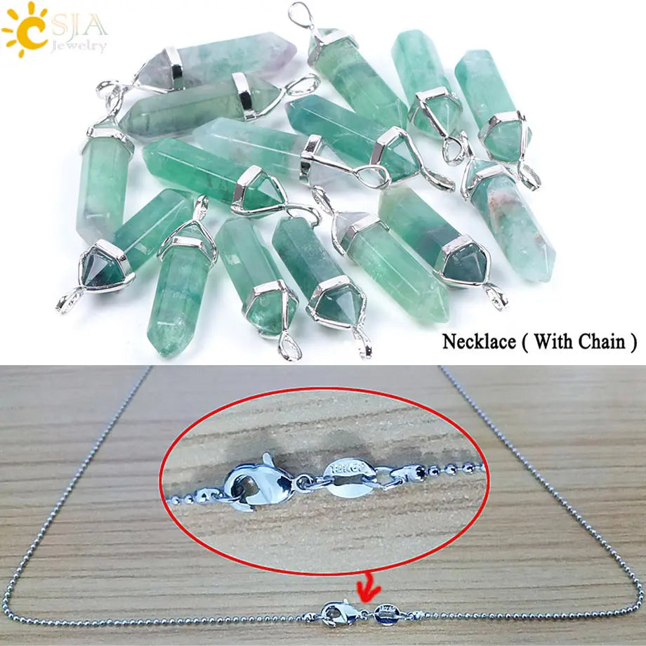 Necklace with green crystal pendants and silver chain on a white background