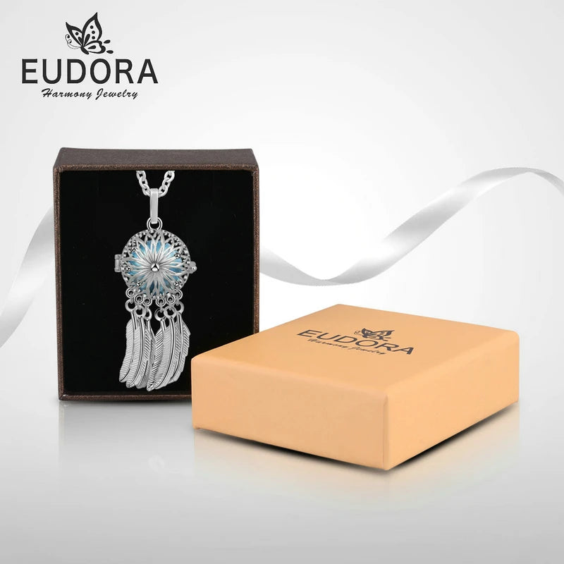 Silver necklace with star design in a Eudora jewelry box on a white background