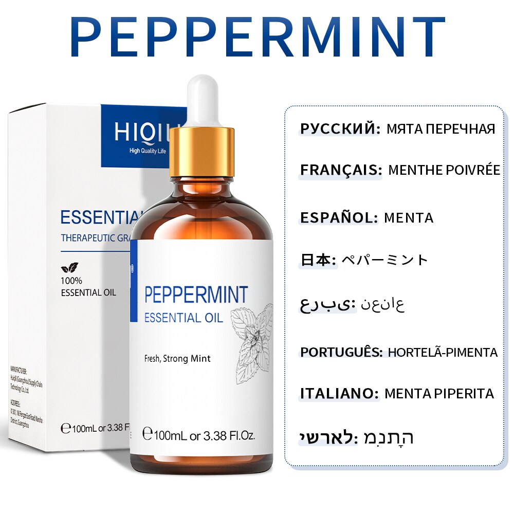 Peppermint essential oil bottle with dropper and packaging on a white background