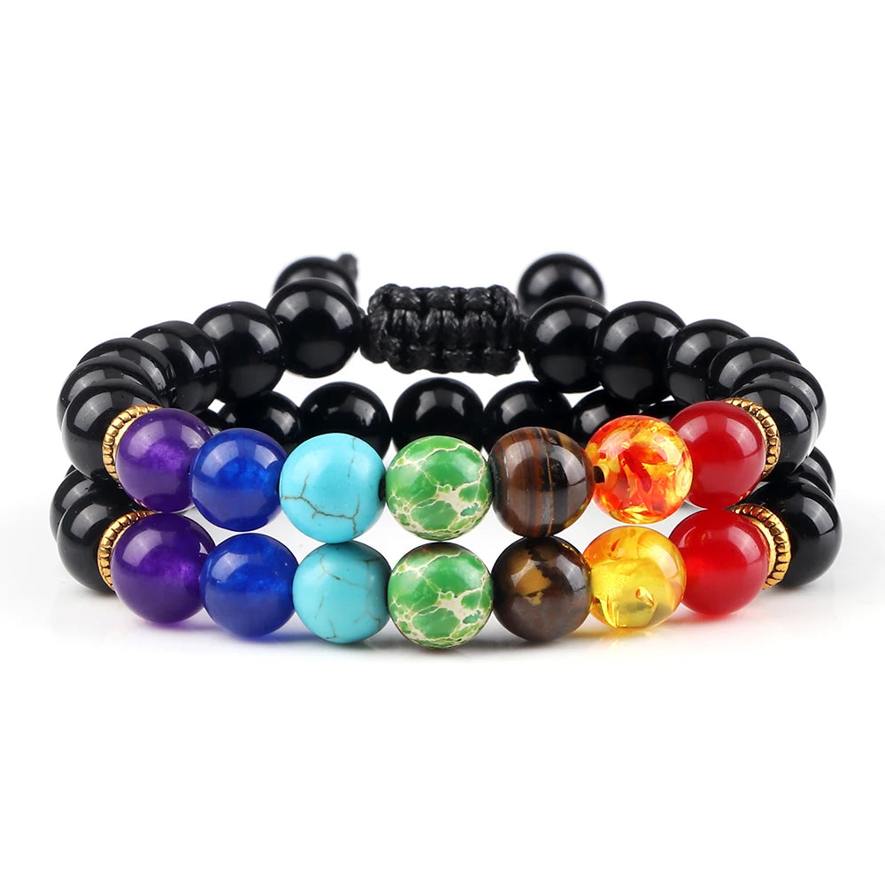 Set of black beaded bracelets with colorful beads on a white background