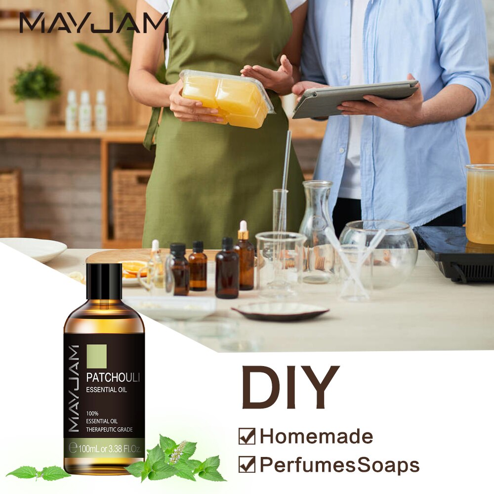 Two people in a kitchen setting with a bottle of MayJam Patchouli essential oil and text about DIY homemade perfumes soaps.