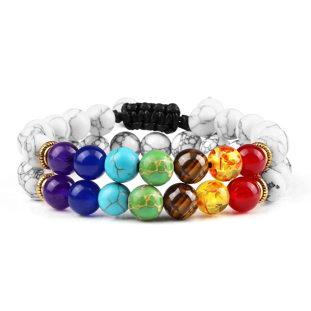 Colorful beaded bracelets on a white background