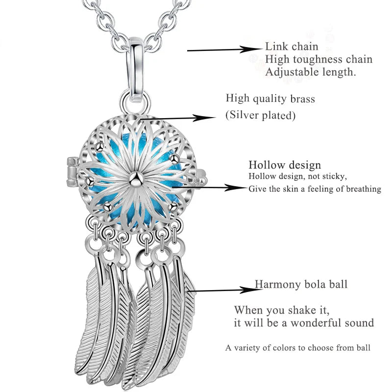 Silver necklace with blue pendant and feather details, labeled features on a white background