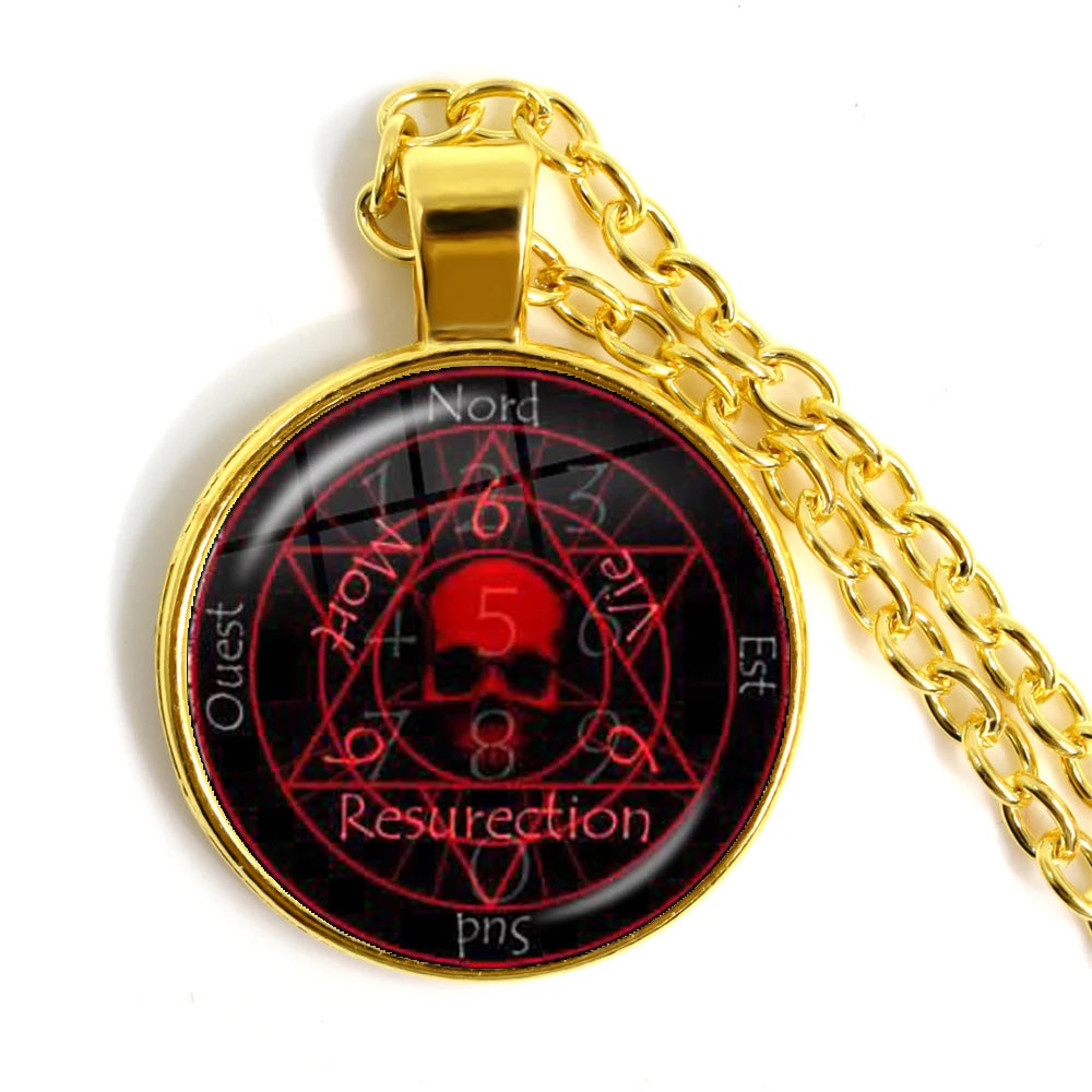Gold chain necklace with a pendant featuring a red skull and black background