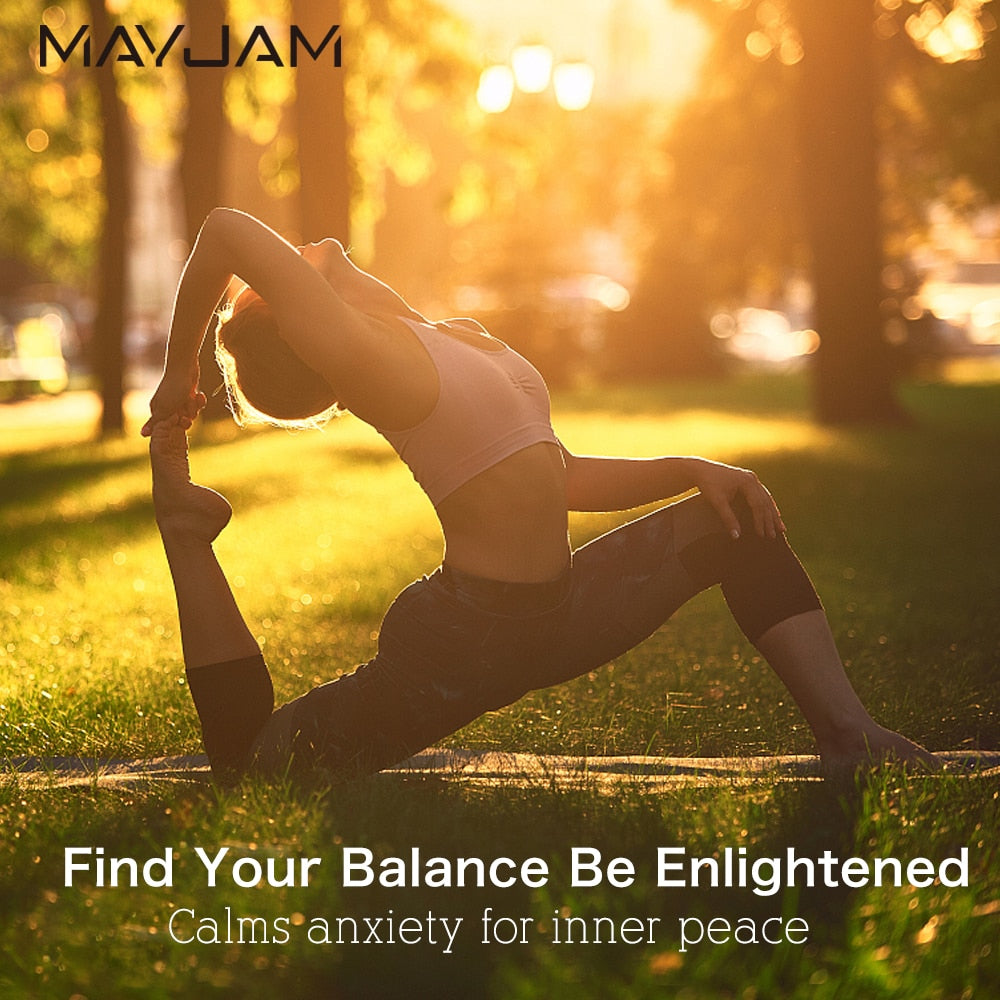 Person practicing yoga in a park with 'MAYJAM' branding and text about finding balance and inner peace.