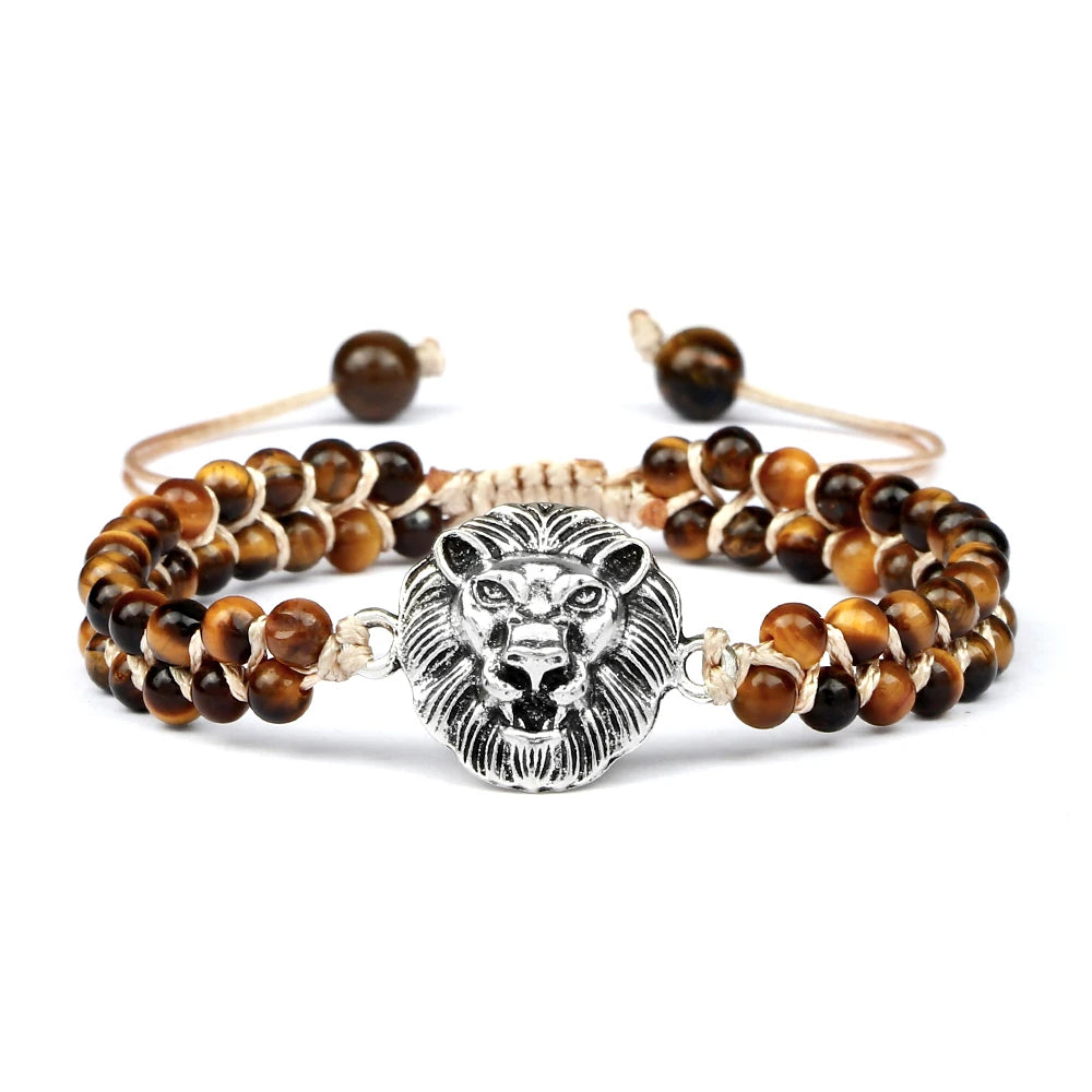 Bracelet with lion head charm and brown beads on a white background