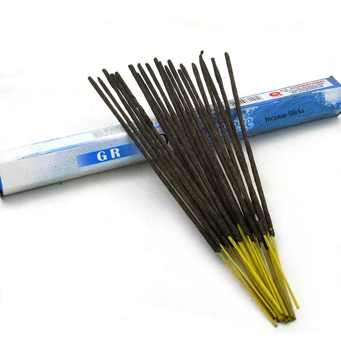 Incense sticks with a blue and white box on a white background