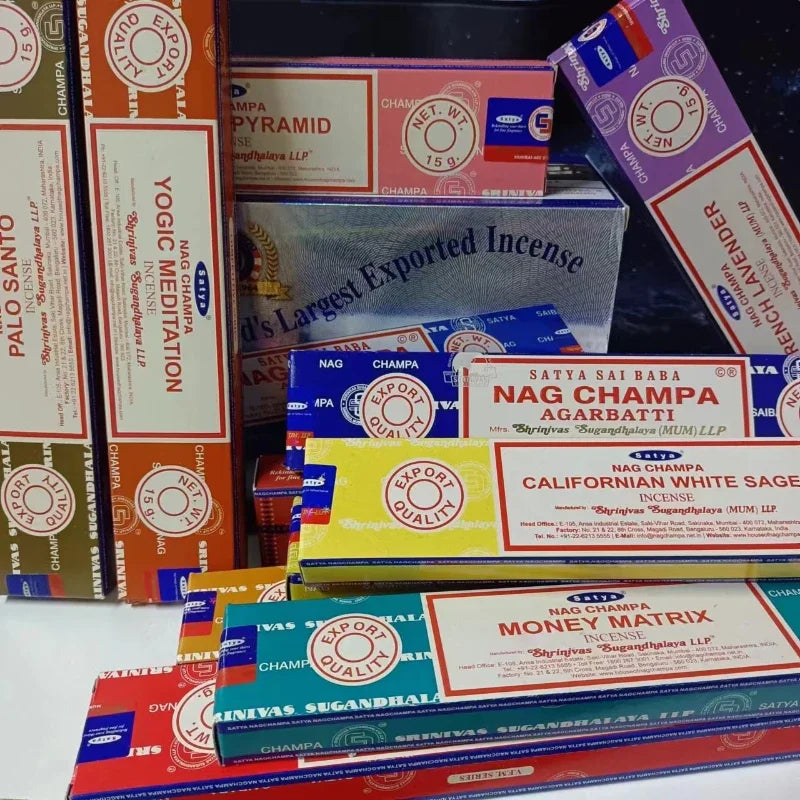 Collection of Nag Champa incense boxes from various brands and scents.