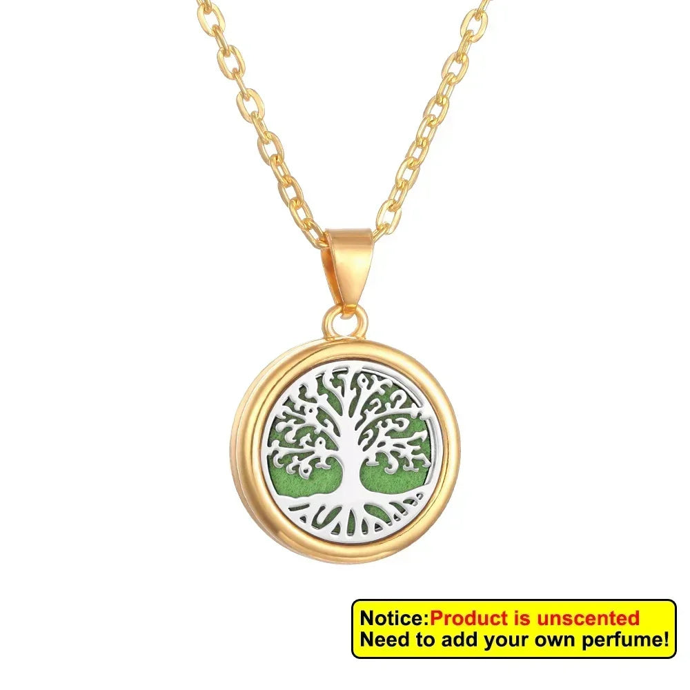 Gold necklace with a green tree pendant on a white background