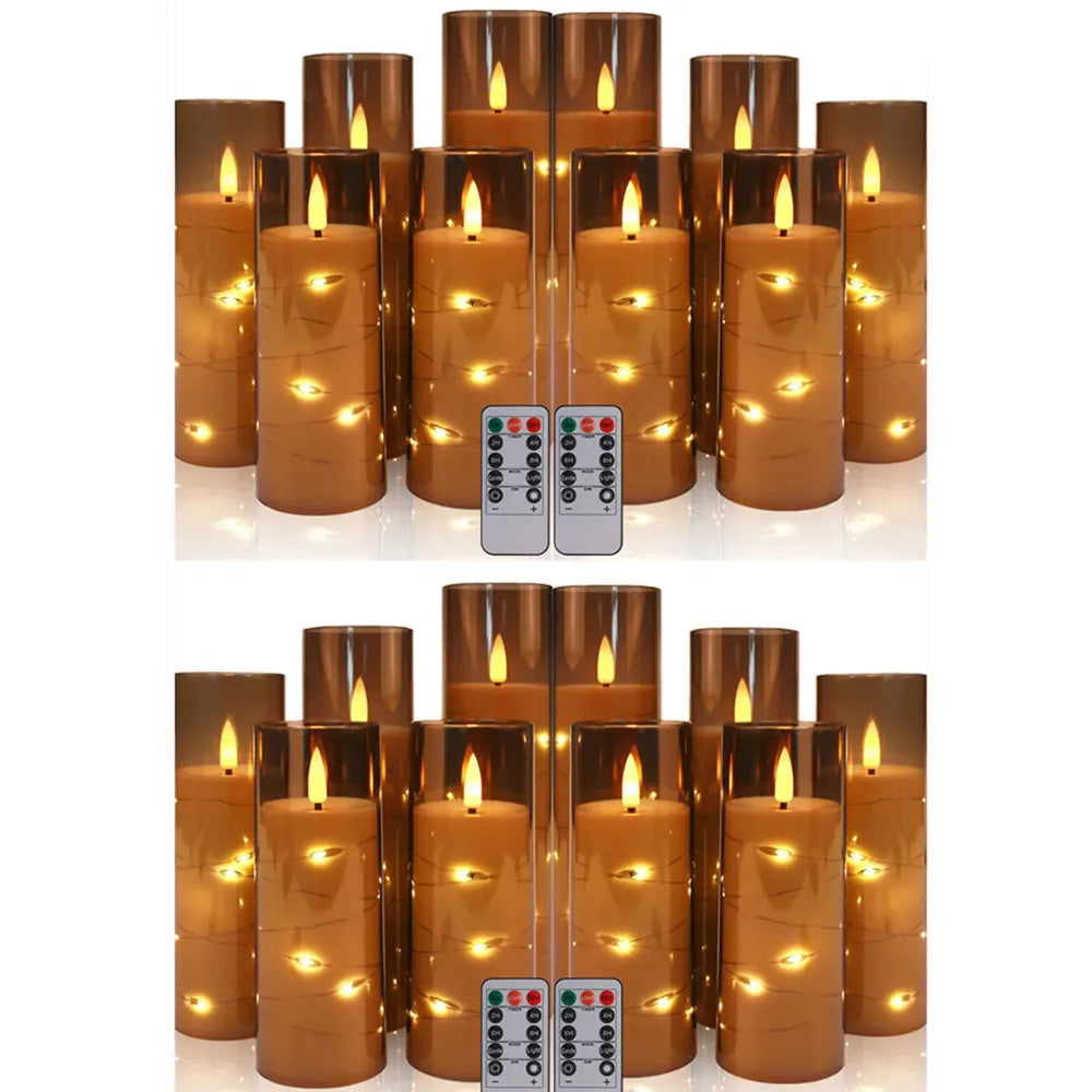 Set of brown LED candles with remote controls on a white background