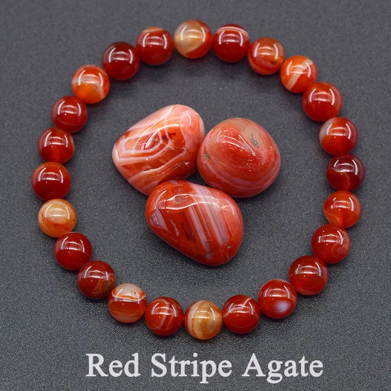 Red stripe agate beads and stones on a dark gray background with 'Red Stripe Agate' text.