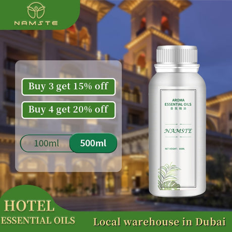 Namste essential oil bottle with promotional text against a blurred hotel background