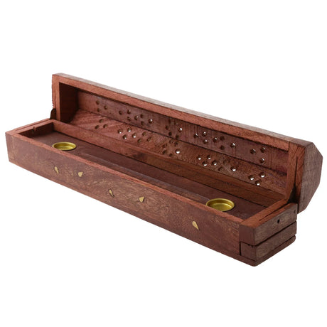 Wooden incense holder with two gold-colored holes on a white background