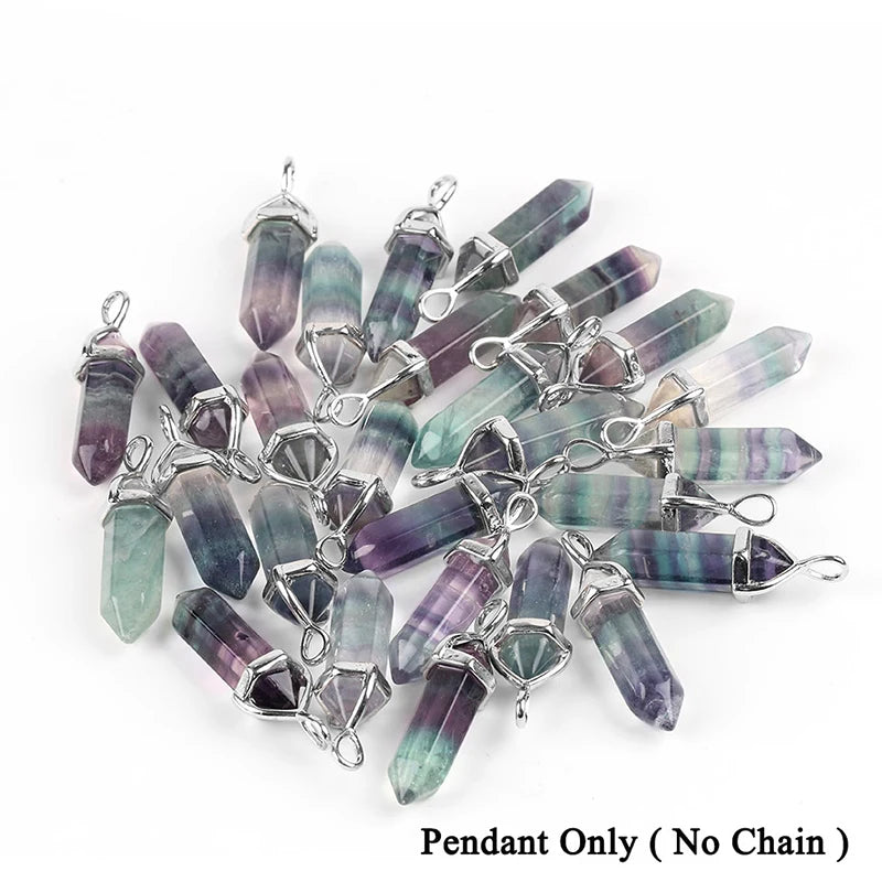 Multicolored crystal pendants on a white background
