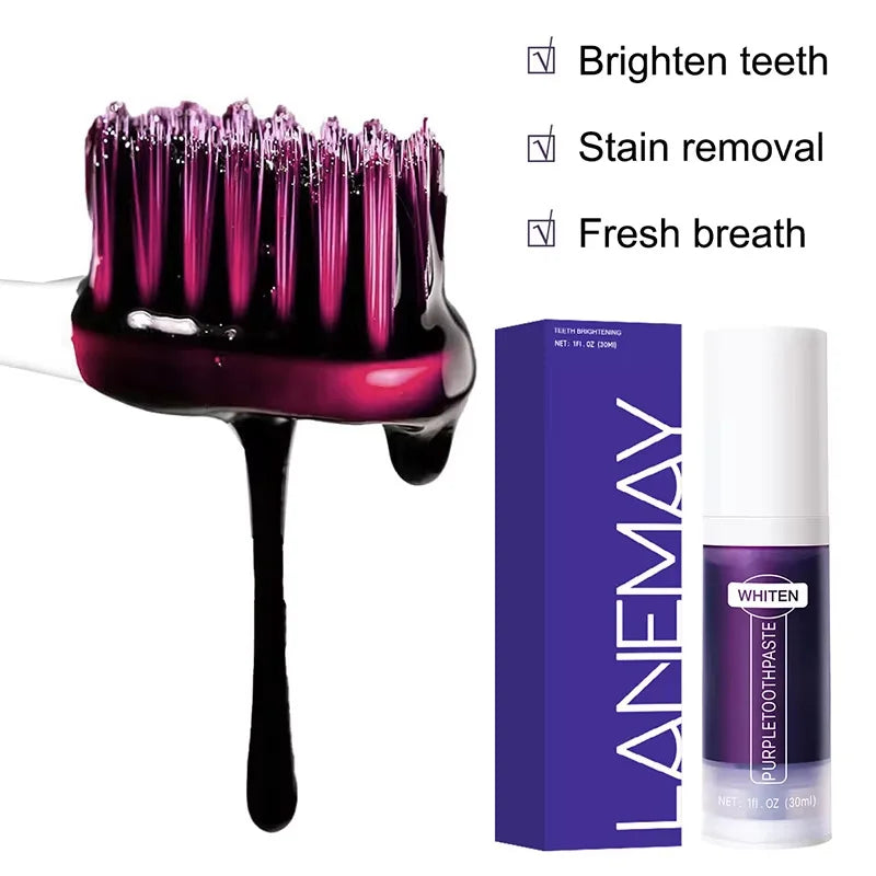 Purple toothpaste with brush, box, and bottle on a white background