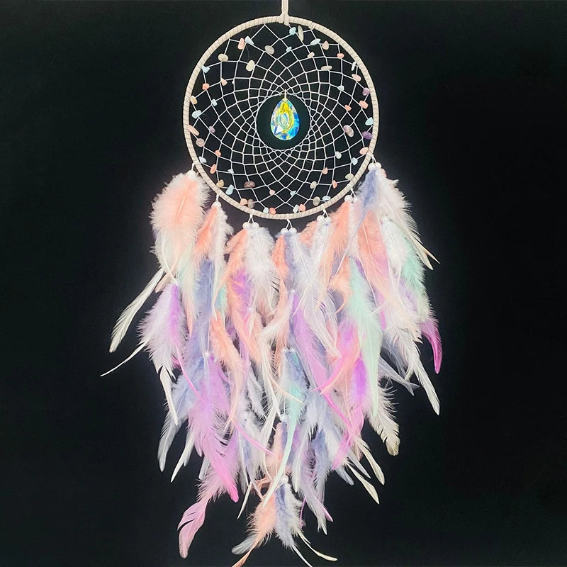 Dreamcatcher with colorful feathers on a black background
