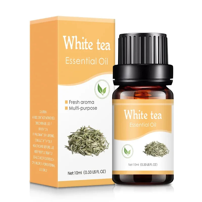 White tea essential oil bottle and packaging on a white background
