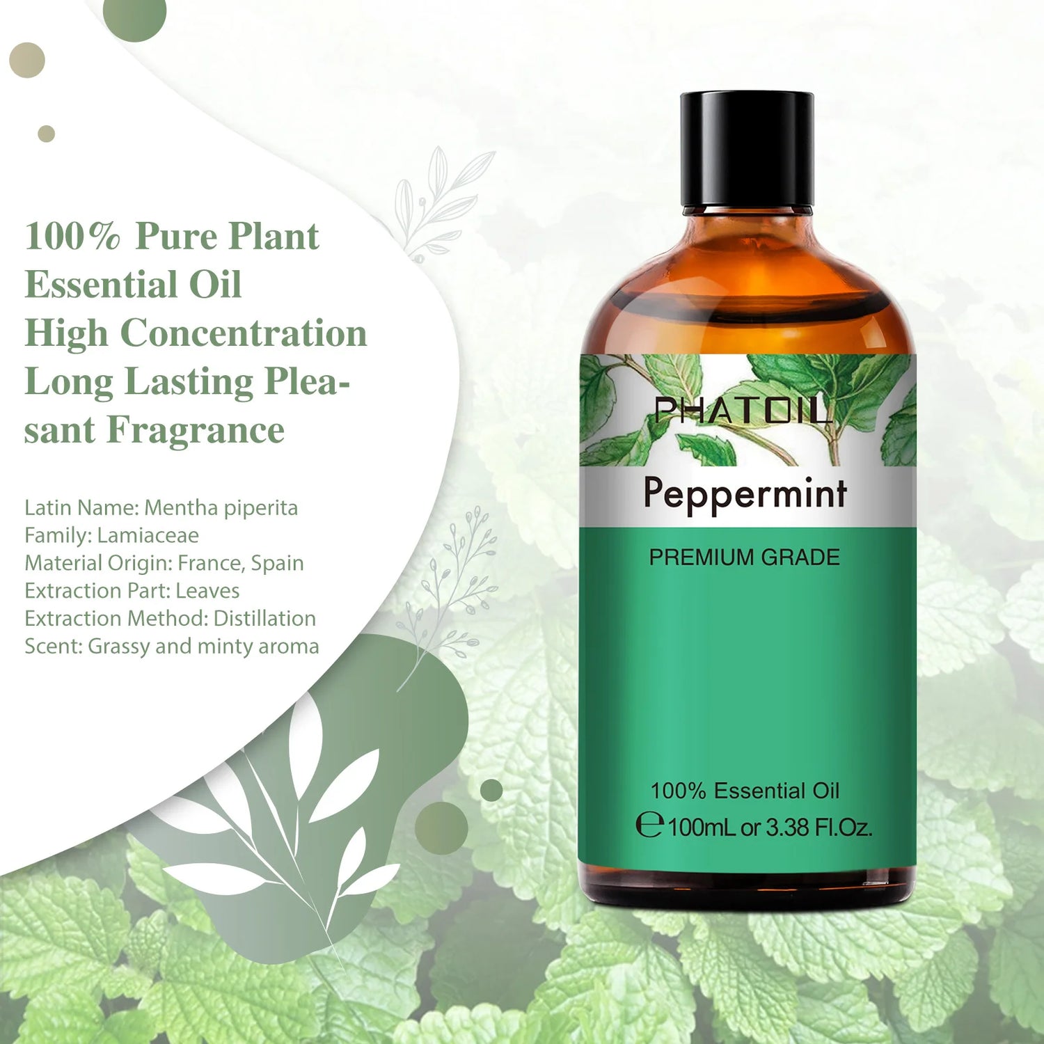 Bottle of peppermint essential oil with green leaves in the background