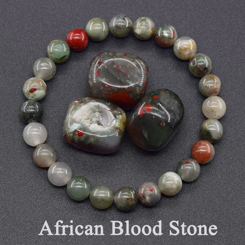 African Blood Stone bracelet with stones on a dark background