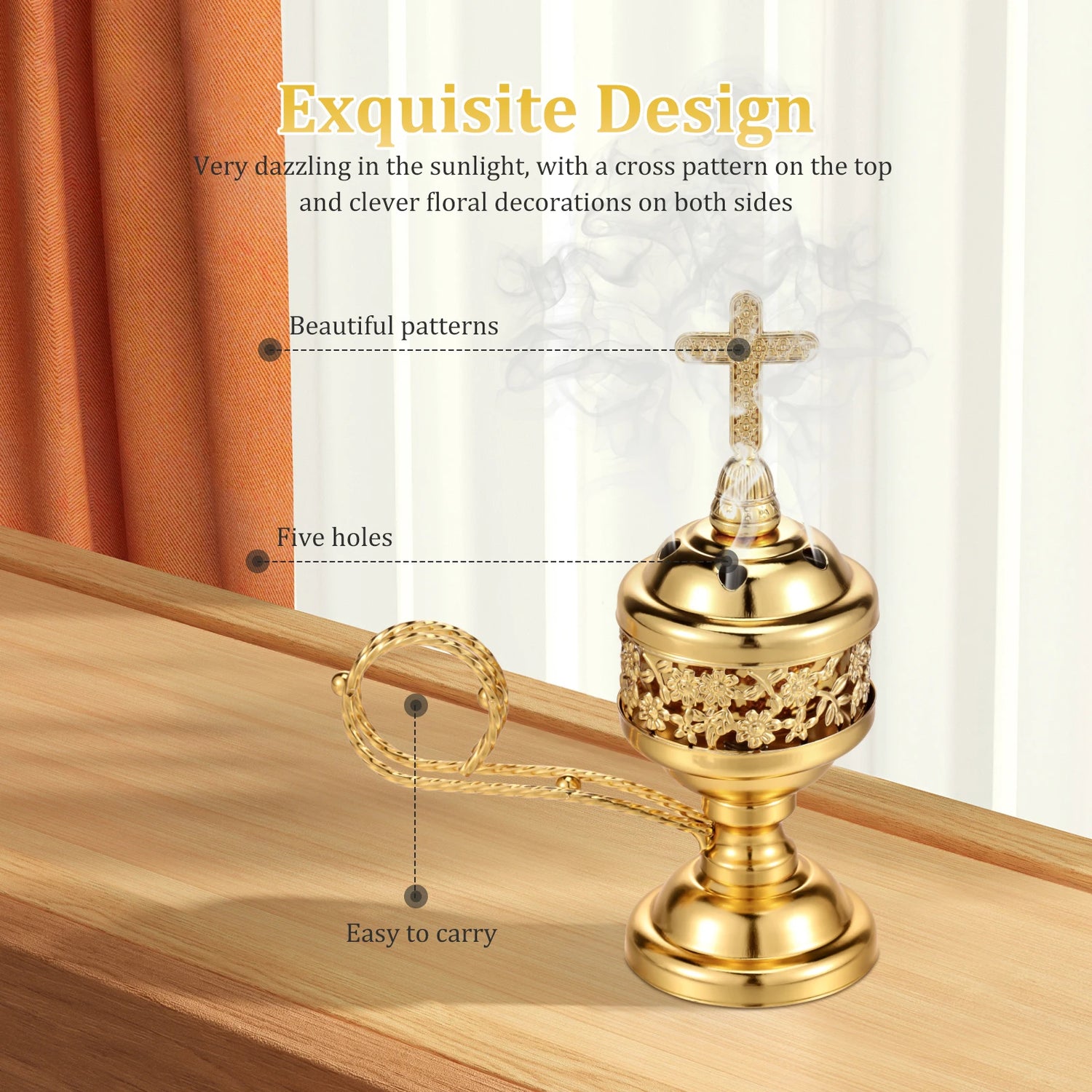 Gold decorative item with cross pattern on top and floral decorations on sides, placed on a wooden surface.