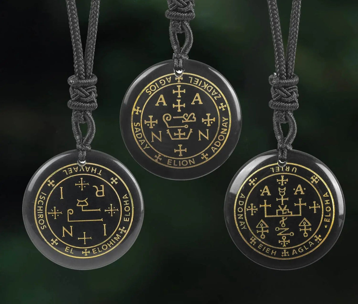 Three circular pendants with intricate designs on a dark background, featuring the brand 'VGDS'.