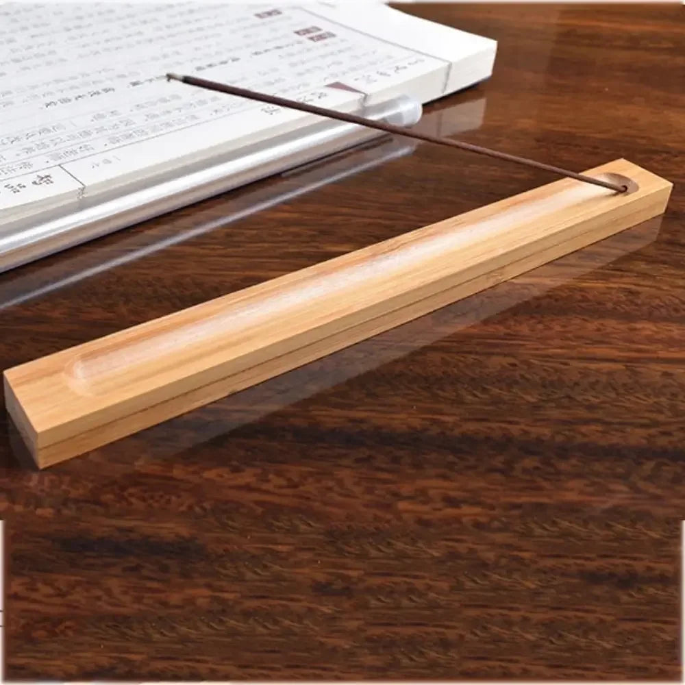 Wooden desk organizer with clear acrylic tray on a wooden surface
