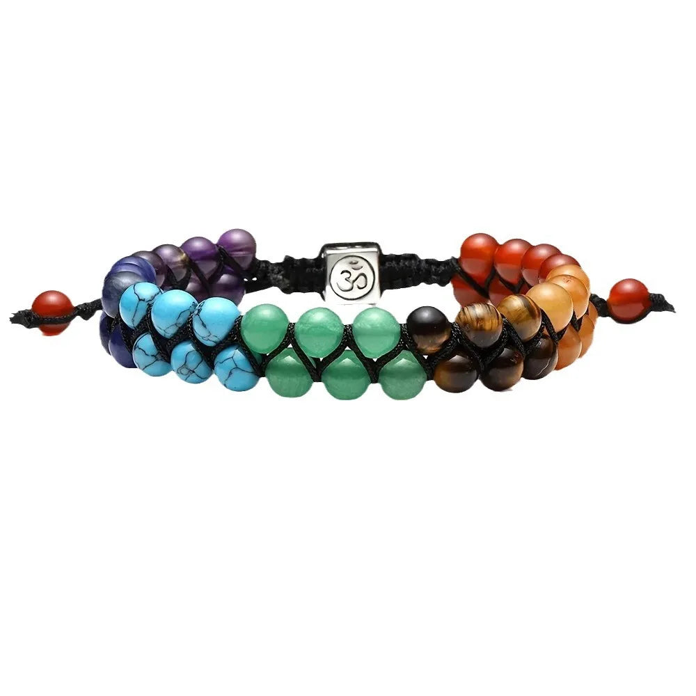 Multicolored beaded bracelet with a central OM symbol on a white background