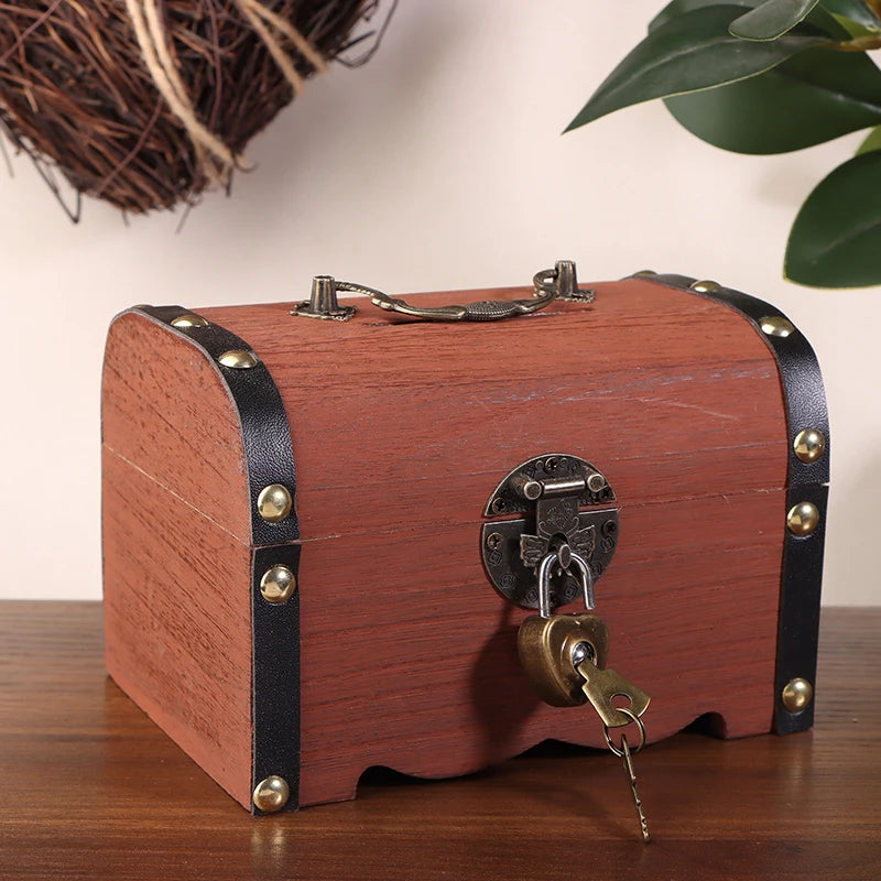 Wooden treasure chest with a lock and key on a wooden surface.