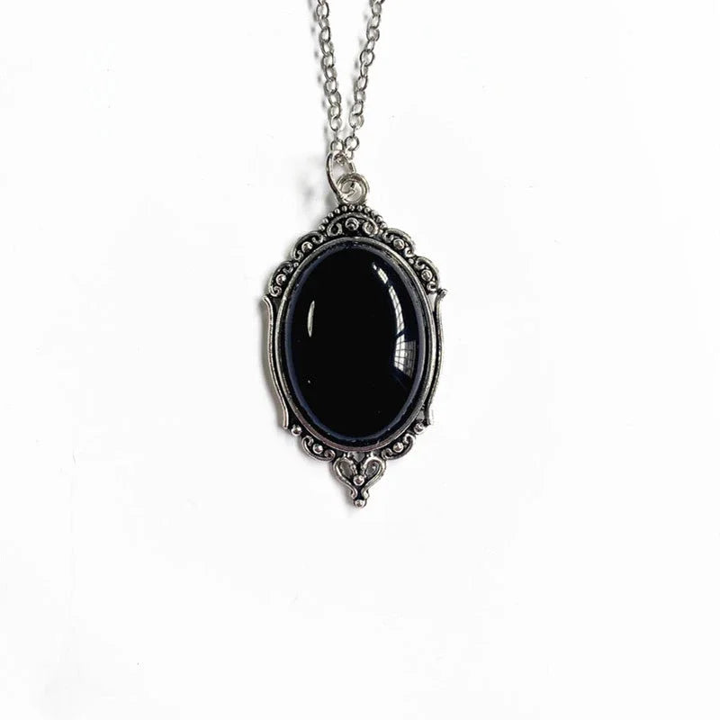 Necklace with a black pendant on a white background