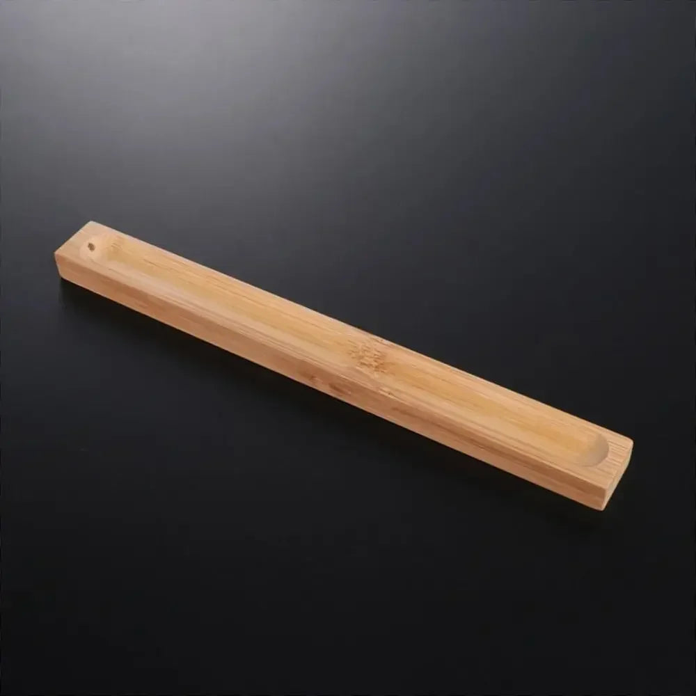 Long wooden strip on a black background